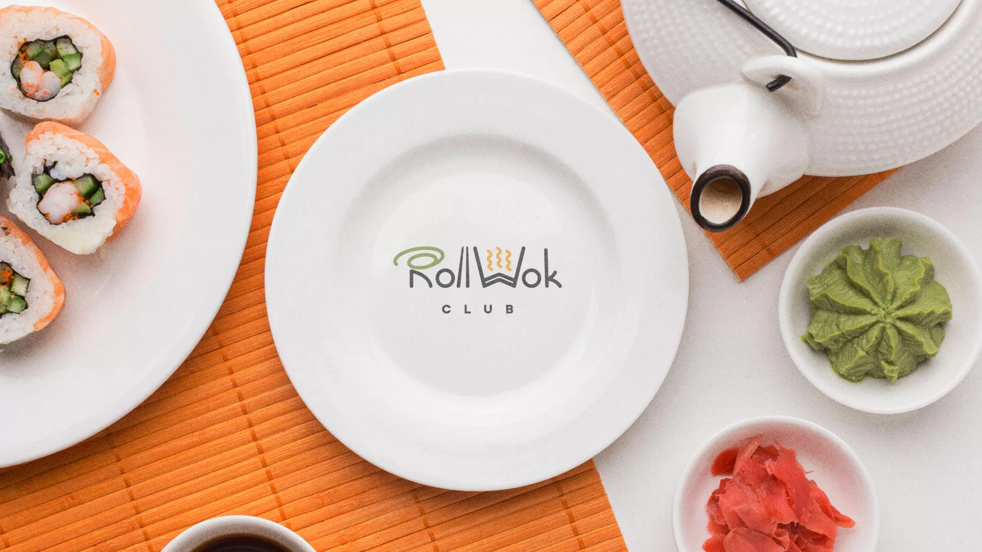 Разработка логотипа и фирменного стиля в Первоуральске для суши-бара «Roll Wok Club» Разработка логотипа и фирменного стиля в Первоуральске для суши-бара «Roll Wok Club»